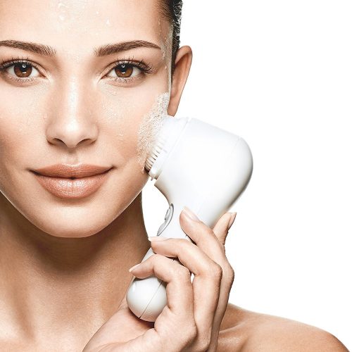 Clarisonic Mia2 and woman using it