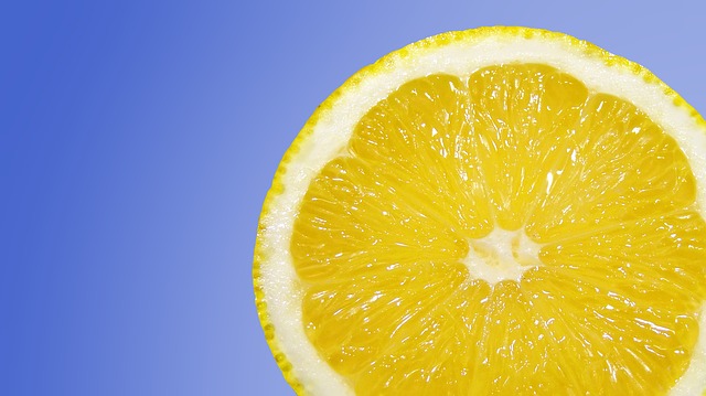 Slice of lemon on a blue background